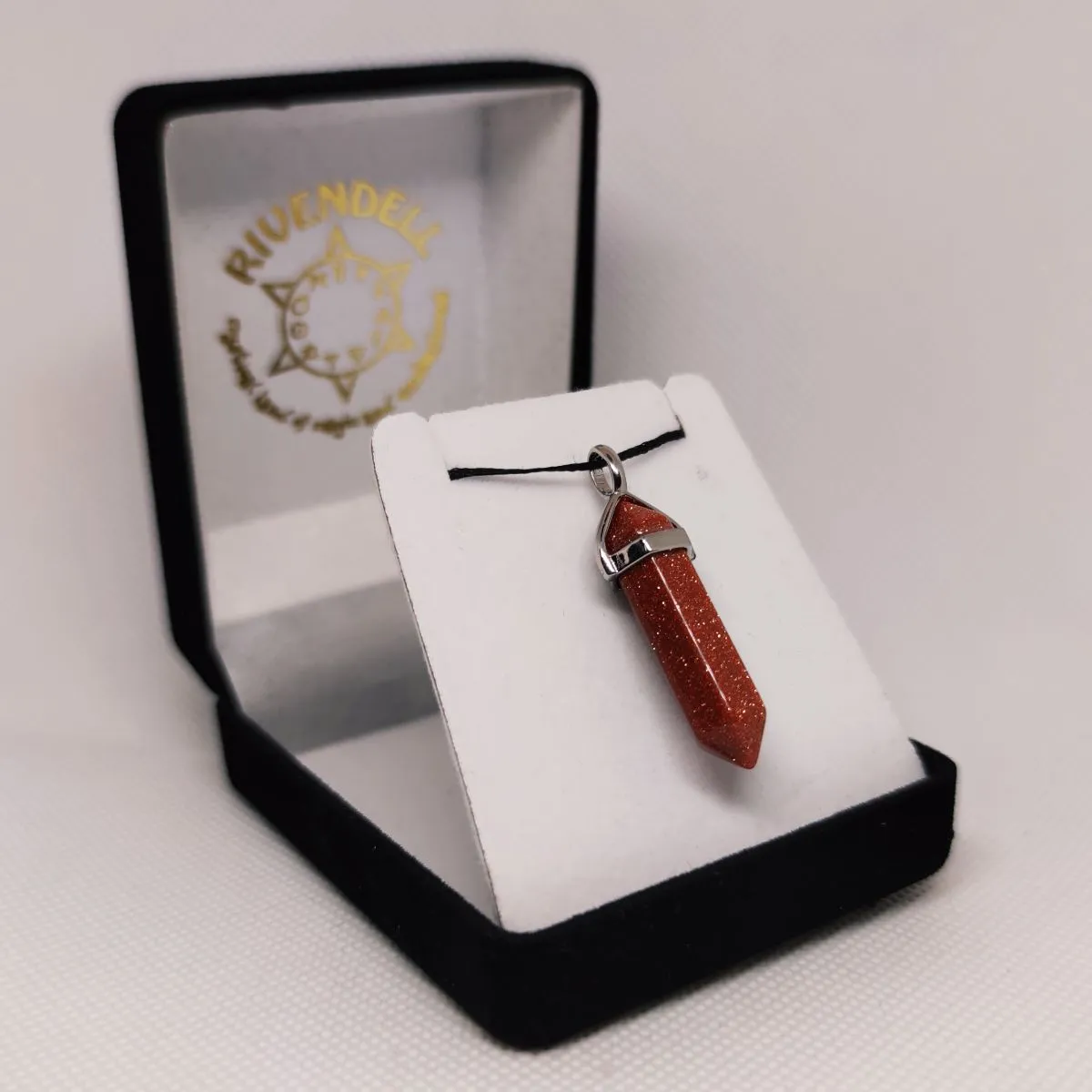 Goldstone Crystal Point Pendant